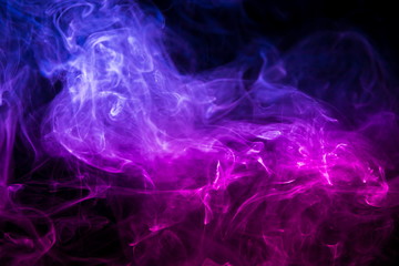 Colored smoke on black background