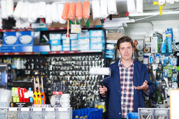 Man  selling rollers for repair