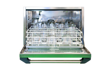 close up glass plate and tea cup or tumbler on basket in open automatic dishwasher machine for industrial isolated on white background with clipping path