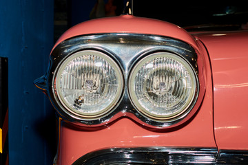 the headlights of an old vintage car