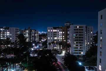 Fototapeta na wymiar city skyline view at night with lights and stars