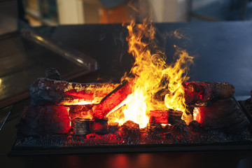 Burning firewood in the kitchen