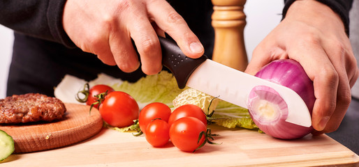 hands cutting vegetables