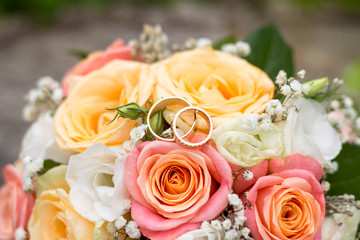 beautiful wedding bridal bouquet and wedding rings