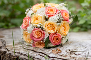 beautiful wedding bridal bouquet and wedding rings