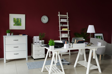 Interior of modern room with stylish workplace