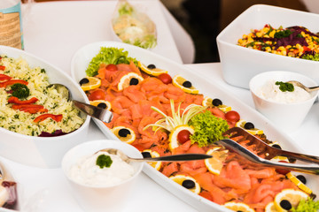 dishes with various salads in buffet restaurant