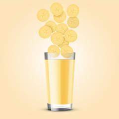 Drinking glass with banana slices falling in smoothie