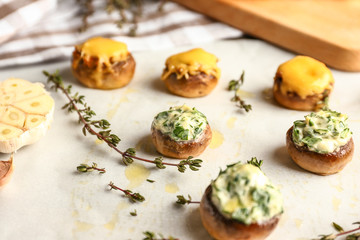 Tasty stuffed mushrooms on parchment