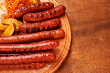 sausages on the grill