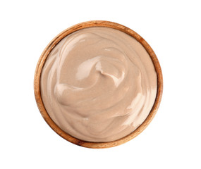 Bowl with chocolate yogurt on white background