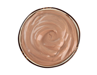 Bowl with chocolate yogurt on white background