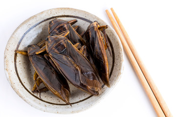 Giant Water Bug is edible insect for eating as food Insects deep-fried crispy snack on plate and...
