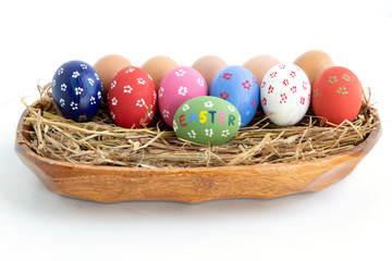colorful easter eggs in a basket