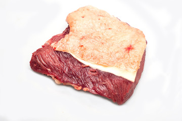 Fresh raw sirloin, with meat and fat, isolated on a white background.