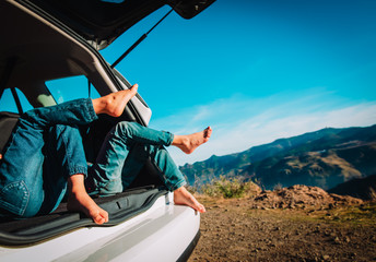 kids relax while travel by car in nature, family vacation in mountains