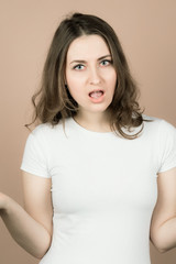 Fototapeta premium Girl with emotions sad anger mad scream