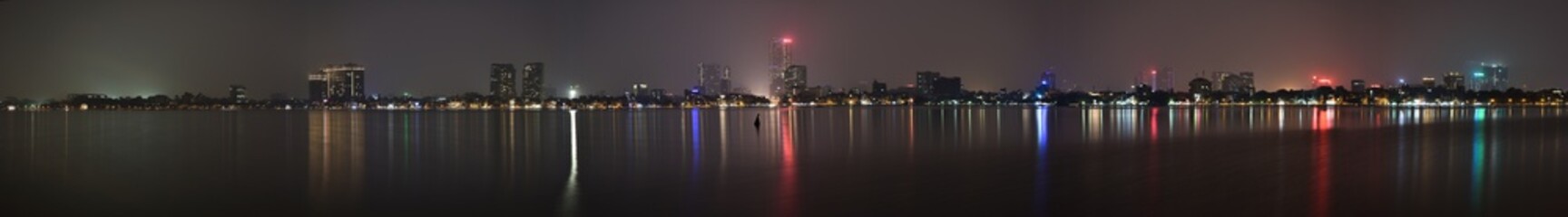 Fototapeta na wymiar Hanoi skyline night panorama from West Lake.