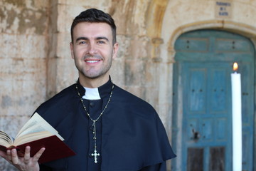 Religious man holding the Bible 