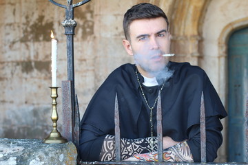 Sexy priest with a rebel attitude 