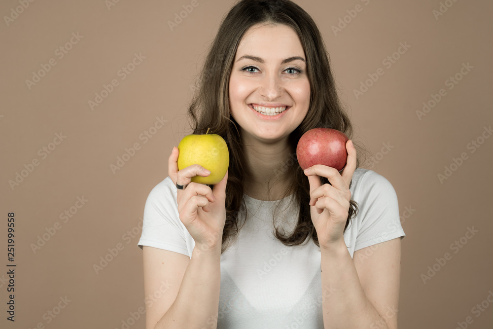 Wall mural girl with an apple