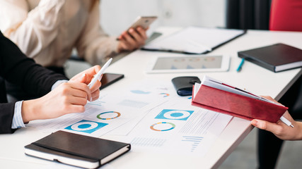 Sale analysis. Business meeting workplace. Office paperwork. Corporate team analyzing diagrams.