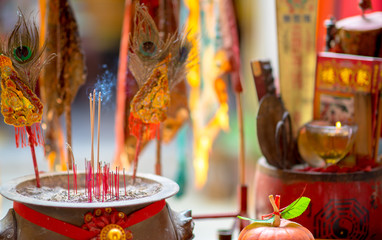 Incense chinese stick in the pot in the new year parade of Phuket Thailand