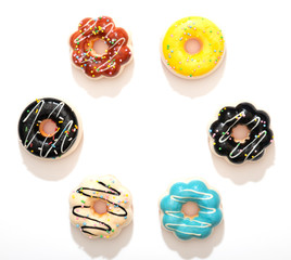 Set of colorful donuts isolated on white background.