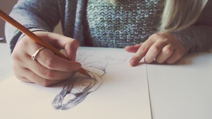 Woman sketching an artwork. Drawing a character. Art and design.
