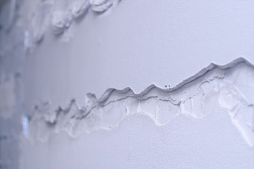 Renovation at home. Plasterer spreading plaster on wall. Who plaster wall plaster master.