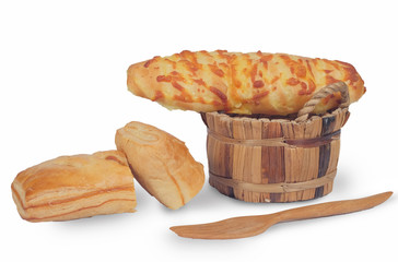 Tasty homemade cheese bread on white background