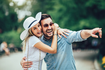 Romantic young couple having fun in the park.