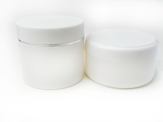 two Cosmetic Package Containers For Cream, Medicine or Gel On Isolated White Background, Ready For Design Template, Round Packagings Of Cream Jar,