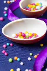Chocolate eggs with sugar confetti
