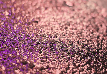 Spectacular texture with bright stains on wet asphalt.