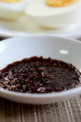 Jim-Jaew, tradition Thai spicy sauce served with sticky rice and boiled egg, easy and delicious food sold in restaurant and street market, popular for local Thai people and tourist, 