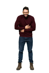 Naklejka premium Full-length shot of Handsome man with glasses smiling a lot while putting hands on chest on isolated white background