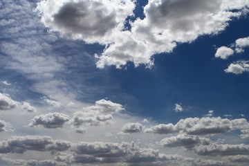 beautiful toned light partially cloudy sky for using in design as background.