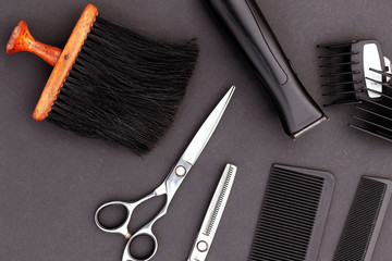 Background for male salon, hairdresser, black. Tools hairdresser, scissors, comb, razor.