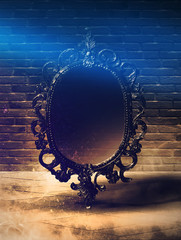 Mirror magic, fortune telling and fulfillment of desires. Fantasy with a mirror, dark room, magical...
