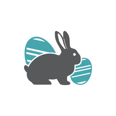 Obraz premium The vector illustration a rabbit sits a splitting off of two Easter eggs. Set of two vector icons. Easter symbol a rabbit and beautifully chiken eggs. Flat design Monochrome
