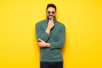 Fototapeta premium Handsome man with sunglasses with glasses and smiling