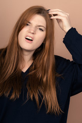 Fototapeta premium Girl with emotions sad anger mad scream