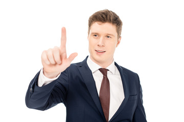 handsome businessman touching something isolated on white