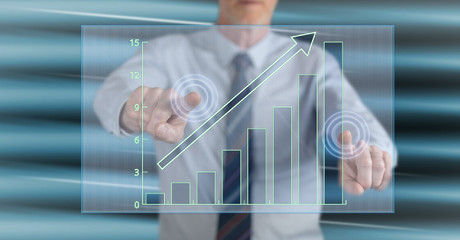 Man touching a financial growth concept