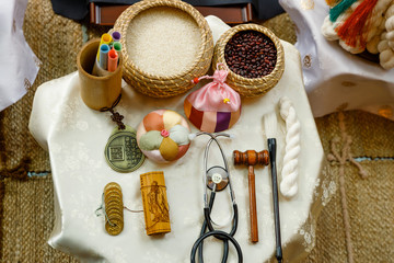 Celebration of the first year of the child. Traditional Korean ritual. Determination of the future fate of the child. National Korean holiday.