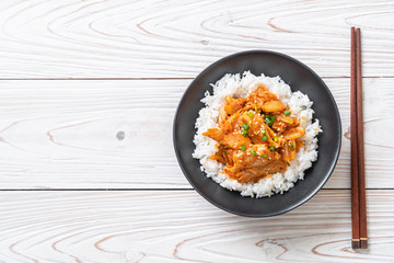 stir-fried pork with kimchi on topped rice