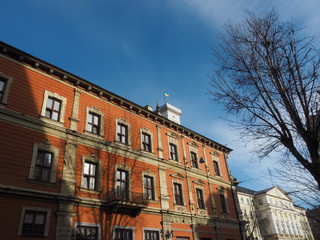 Fototapeta na wymiar House on the corner of the Cathedralna street and Rynok Square in Lviv