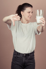 girl drinks milk and is happy