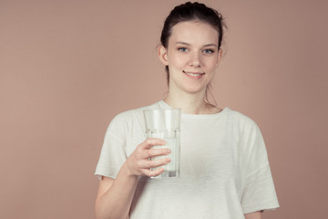 girl drinks milk and is happy